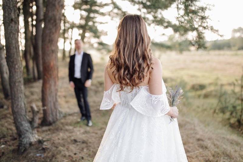 Wedding couple embracing in nature